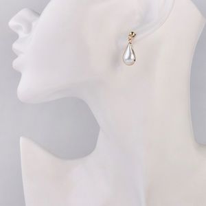 Dainty teardrop pearl earrings